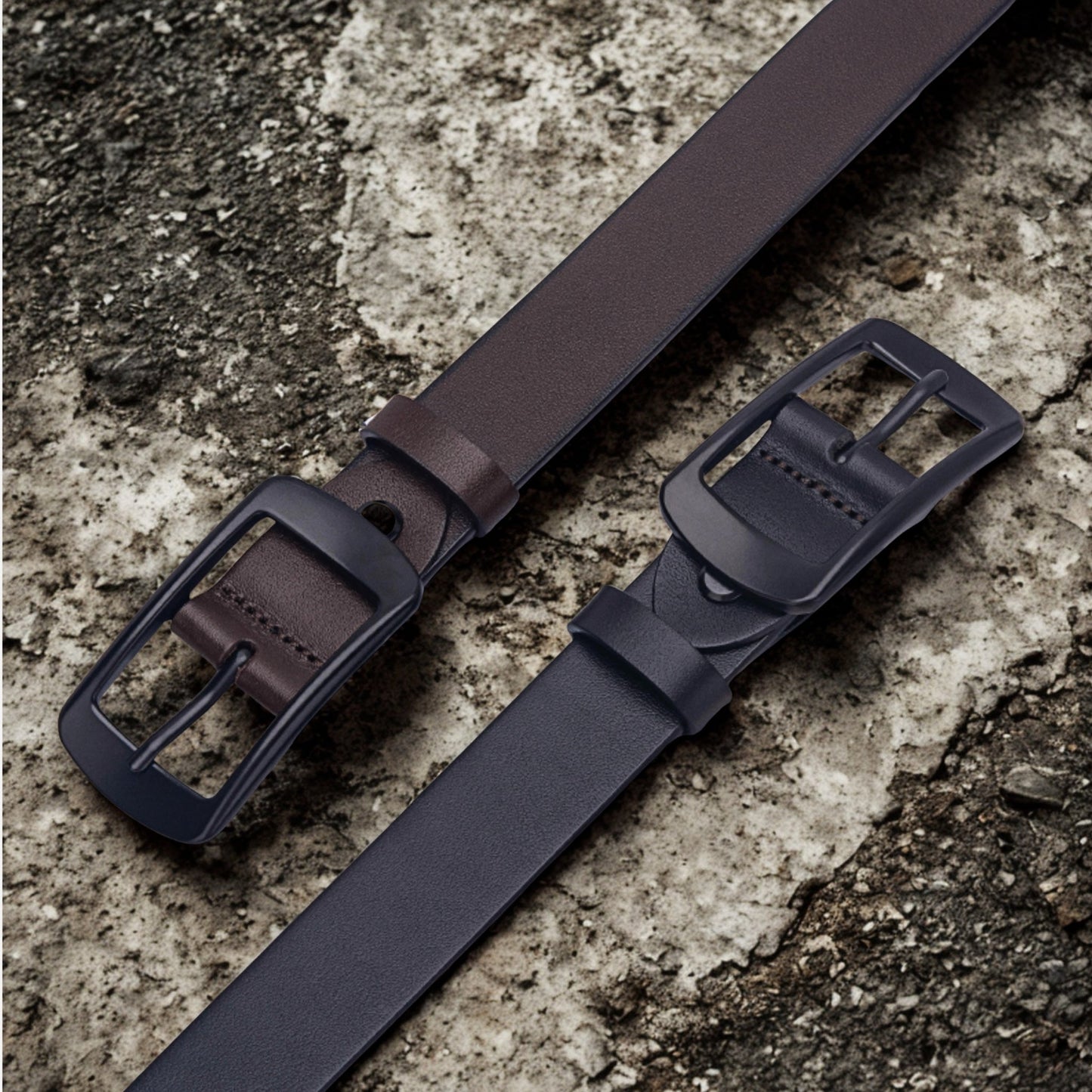 28mm Black and Brown Leather Belt with Black Buckle on a concrete benchtop - BeltUp Leather Co.